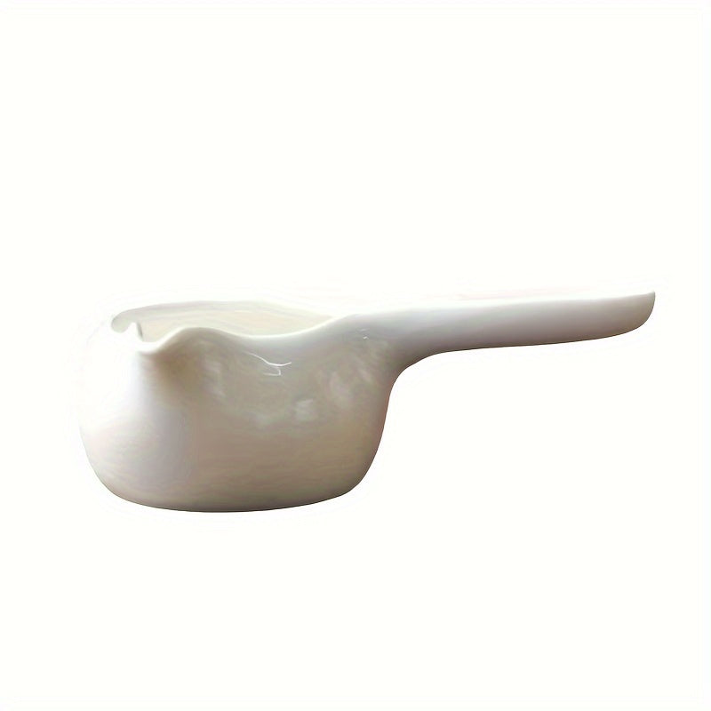 A Set of Two Items That Consists of a Candle Melting Pot And a Heat-Resistant Aroma Diffuser for Home Use, Showcasing a Japanese Ceramic Tea Roasting Pot Along with an Essential Oil Burner